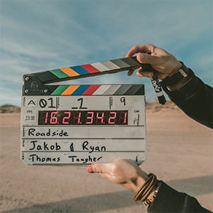 person holding clapboard